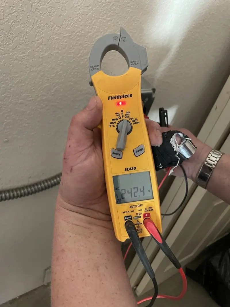 Voltage testing with clamp meter during Generator Installation in Fairview